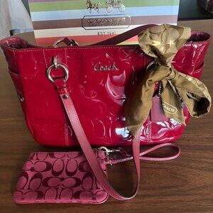 Coach Dark Red Patent Leather bag with Gold Coach bow and  Coach logo accessory